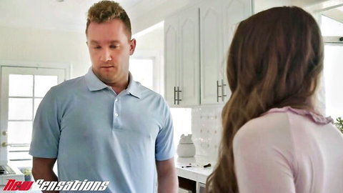 Brunette in pink top chats with man in kitchen before babysitter fuck session