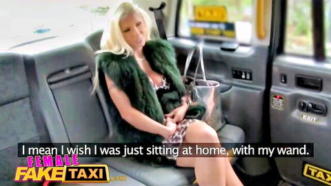 Big titted blonde babe teases deep cleavage in taxi backseat