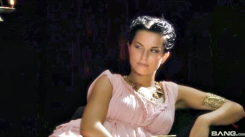 Vintage AI-enhanced brunette in ancient Roman pink gown, solo seductive pose