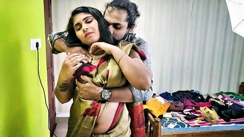 Man gropes tits and passionately kisses neck of curvaceous Indian wife in golden saree