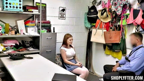 Katerina DeVille redhead in white top and skirt, shoplyfter interrogation scene