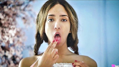 Mixed brunette teen babe with perky tits teases blowjob sticking tongue out finger to open mouth