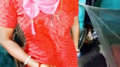 Sexy Indian housewife in red embroidered dress and pink hijab posing naughtily