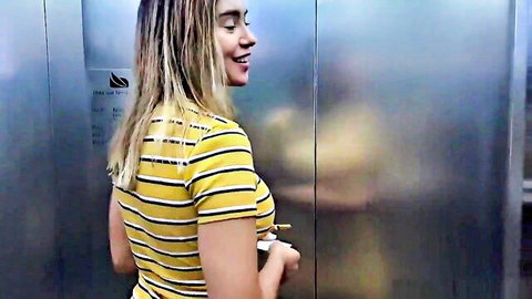 Hot smiling Latina wife in yellow striped top in elevator