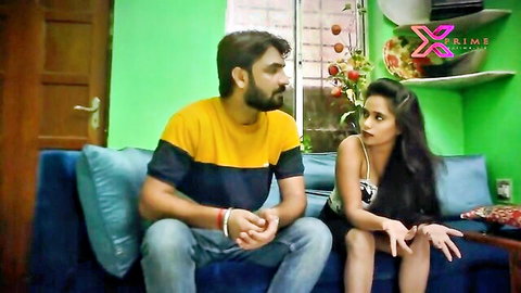 Bearded Indian guy and sexy desi teen in black top tease on couch