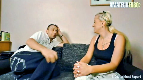 Blonde German MILF Sandy sits with stud on couch before pounding