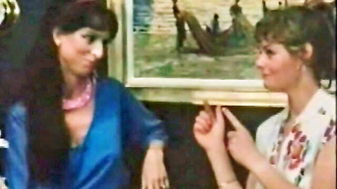 Vintage retro women with big tits gesturing flirtatiously in low-cut blouses