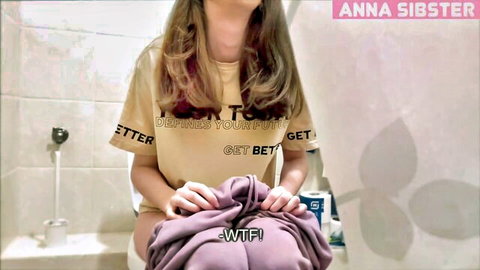 Anna Sibster in yellow t-shirt and towel, post-bath tease