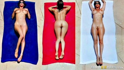 Tanned athletic babe with big tits poses fully nude on blue red and white towels exposing shaved pussy and round ass