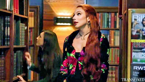 Seductive redhead trans babe in floral jacket eyes busty brunette in steamy library tease