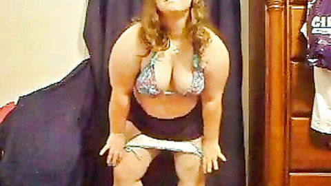 Curvy BBW webcam babe teasing in skimpy purple bikini pulling down bottoms to flash bush