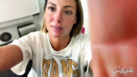 Sultry blonde MILF in oversized white VANS t-shirt teases with parted lips in kitchen selfie