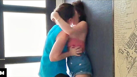 Stepdad DILF passionately kisses topless teen stepdaughter pinned against wall groping her bare tits