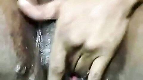 Ebony babe's wet hairy pussy fingered deep and spread gaping by hand