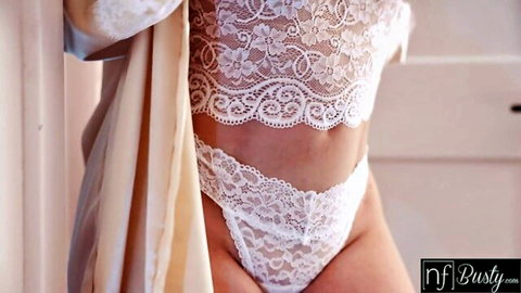 Busty tanned curvy babe in sheer white lace lingerie teasing huge natural tits and hips