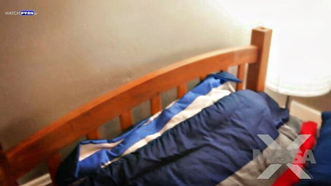 Empty bedroom bed with rumpled blue comforter ready for taboo fuck