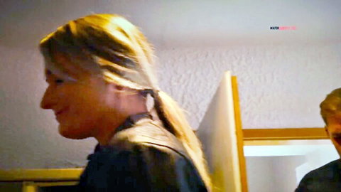 Blonde Melina-May in profile smile, ponytail, with man in POV deepthroat setup