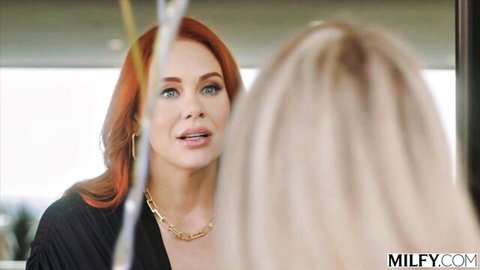 Maitland Ward and Brandi Love intimate close-up in bed, redhead MILF gazing at blonde