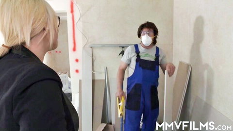 Thick blonde in tight dress chats with masked repairman in MMV Films scene