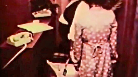 Retro hotel maid in polka dot dress during hot lesbian pussy licking session