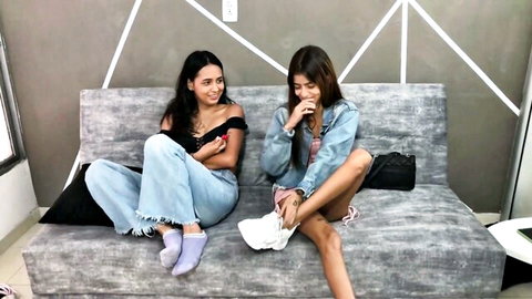 Hot Asian stepsisters lounging playfully in homemade video thumbnail