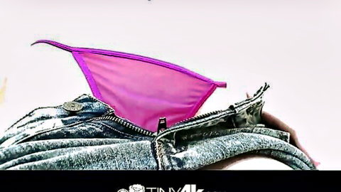 Tali Dova teases with pink thong pulled aside over unzipped jeans