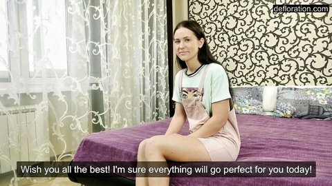 Adelyn Abbe in cute romper, smiling confidently on bed for virginity loss