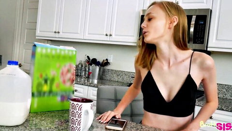 Hot blonde stepsis in black spaghetti strap top teasing with milk carton
