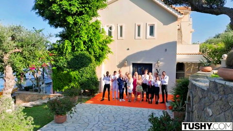 Tushy pornstars group posing clothed on red carpet at luxury villa entrance
