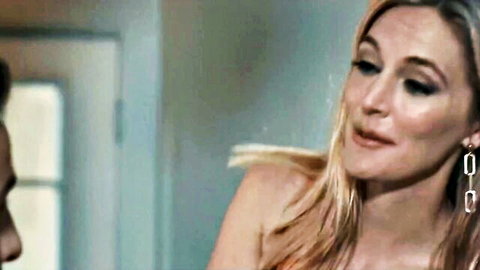 Blonde MILF Mona Wales in seductive orange top, teasing new neighbor