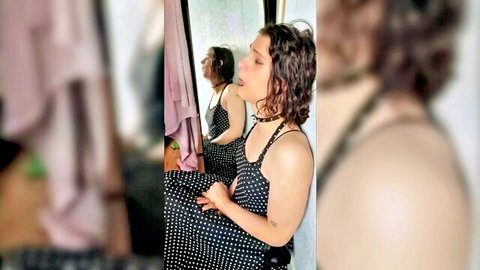 Curvy amateur babe in polka dot dress posing seductively in mirror selfie