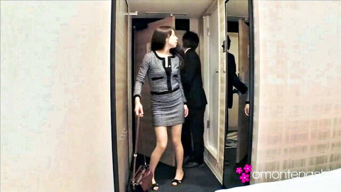 Naughty Japanese office lady in short tweed skirt enters hotel room with suited man teasing upskirt