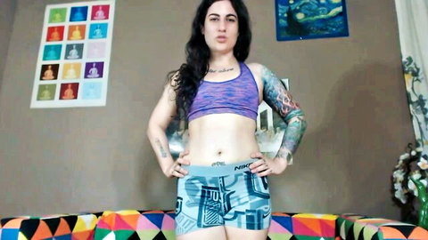 Goddess Green Eyed in purple sports bra and gray shorts, teasing for JOI stamina session