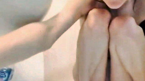 Teen girl fingers her shaved pussy with legs spread wide exposing small tits