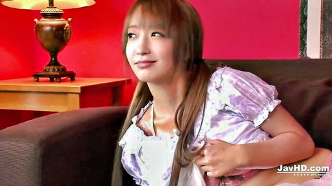 Sana Anzyu in seductive purple blouse, smiling with pigtails