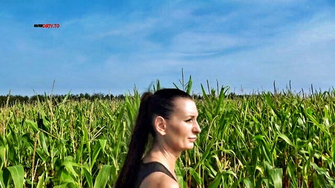 Kati Franck's tattooed fit body in cornfield, outdoor tease