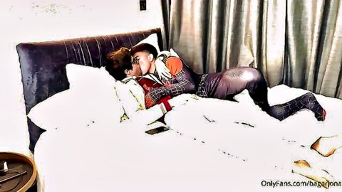 Two hot gay guys passionately French kissing on bed in tight cosplay outfits