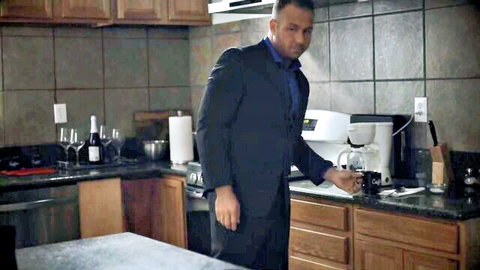 Suited man in kitchen holding coffee mug, April Olsen in Perfect Mist