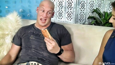 Presley Hart with bald stud on couch in teasing adult preview