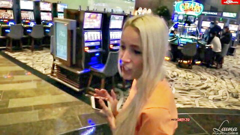 LauraParadise blonde bombshell in orange top at casino, seductive glance