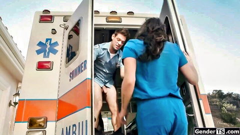 Bailey Archer in blue scrubs with Michael DelRay in paramedic uniform at ambulance
