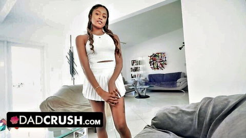 Young ebony teen in white crop top and mini skirt teases seductively