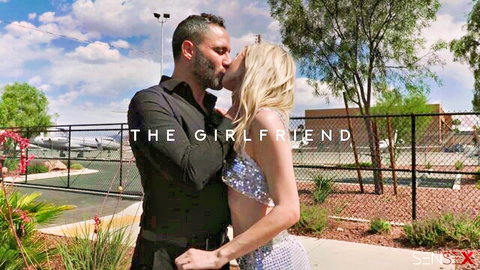 Jill Kassidy kissing her boyfriend passionately in sparkly top and plaid skirt