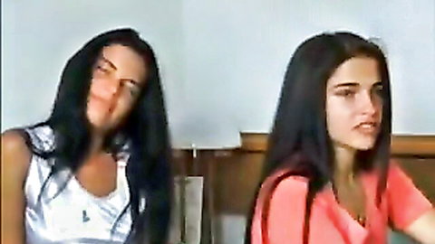 Two hot raven-haired women in tank tops, casual allure