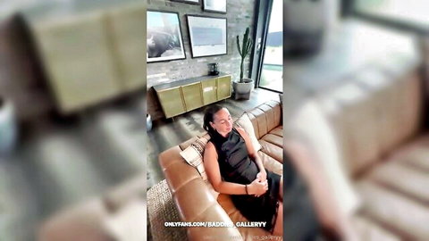 Ashley Aoky smiling seductively in black top, OnlyFans tease