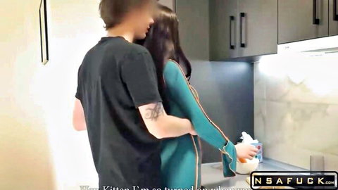 Amateur Asian teen in green dress interrupted for quick kitchen hug and fuck