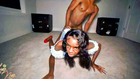 Ebony beauty in off-shoulder top and red heels gets doggy-style from naked black stud