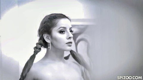 Vanna Bardot Latina beauty with braided hair in seductive BDSM portrait