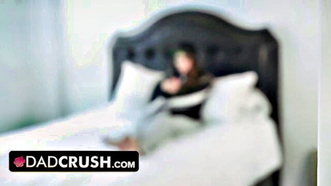 Blurry image of gorgeous babe on bed in stepdad taboo video