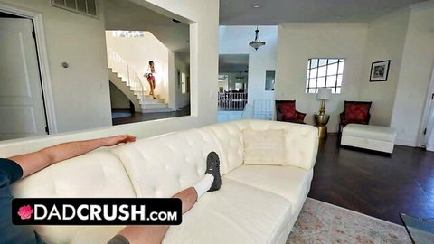 Stepdad on couch watches stepdaughter in pink dress head upstairs
